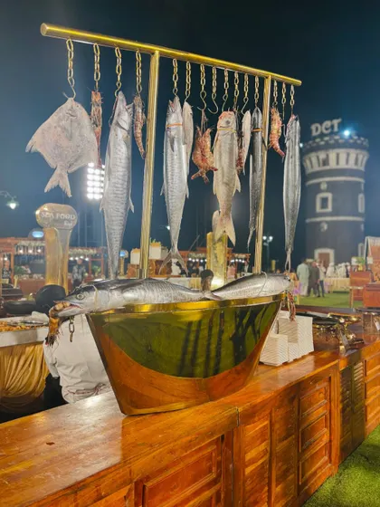 The seafood counter set against the backdrop of the venue, showing how my setups integrate with the event space.