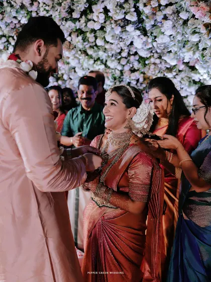 The sacred thali tying ceremony, a moment of deep significance and emotion, surrounded by family.