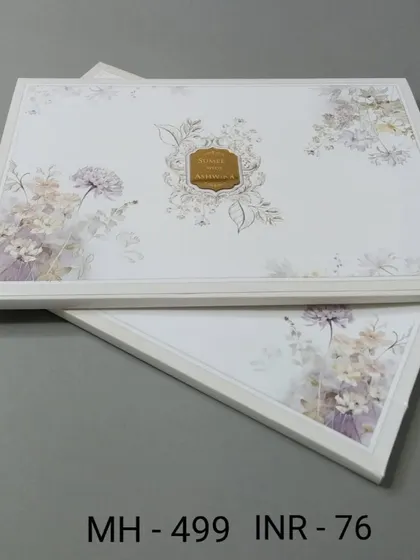 This framed invitation features a delicate lavender floral print on a white background. The design is light, airy, and perfect for a modern spring wedding.