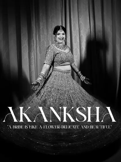 A beautiful black and white bridal portrait where the bride is joyfully twirling in her lehenga. The text overlay adds a touch of elegance, making it feel like a magazine feature.
