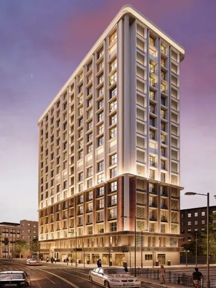 An evening render of a residential tower for Platinum Corp in Mumbai. The lighting design is crucial, highlighting the building's form and creating a warm, inviting presence in the urban skyline.