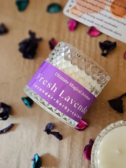 A close-up of the 'Fresh Lavender' candle, showing the beautiful diamond-patterned crystal jar. The jar can be repurposed after the candle is finished.