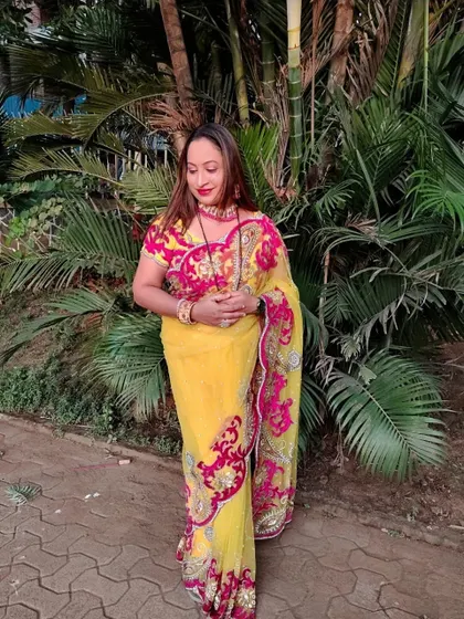 The intricate embroidery on this designer saree makes it look so rich and elegant.