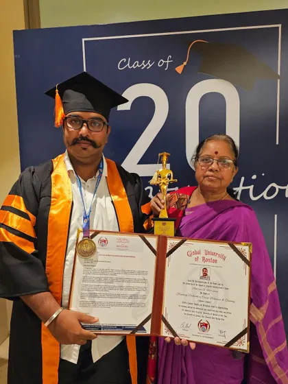 Sharing a proud moment with my mother after receiving the honorary PhD from the Global University of Boston. Her support has been instrumental in my journey as a canine behaviorist.