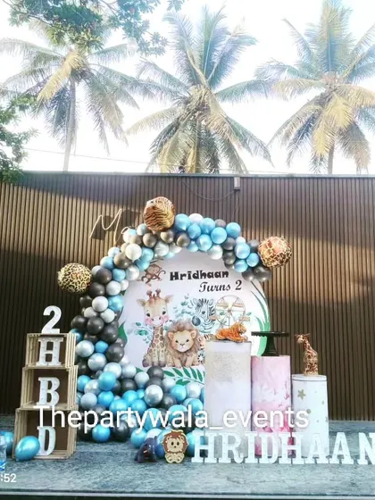 A modern take on the jungle theme with a blue and grey color palette and a leopard cutout.