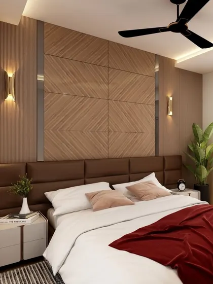 A warm and inviting bedroom设计 with a wooden-paneled accent wall. The upholstered headboard and soft, ambient wall sconces create a cozy and comfortable atmosphere.