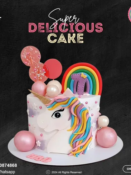 A magical unicorn cake featuring a colorful rainbow mane and a sparkling horn. This design is adorned with pink and pearl-like spheres, making it a truly enchanting centerpiece for a birthday.