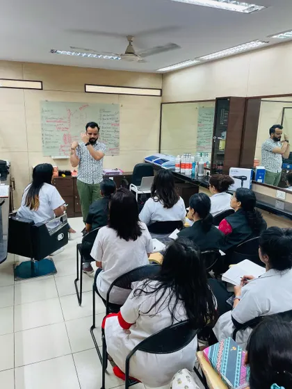 Theory is the foundation of practical skill. Here, our expert faculty conducts a detailed theory session on hair smoothening treatments, covering product knowledge and application methods before students move to hands-on practice.
