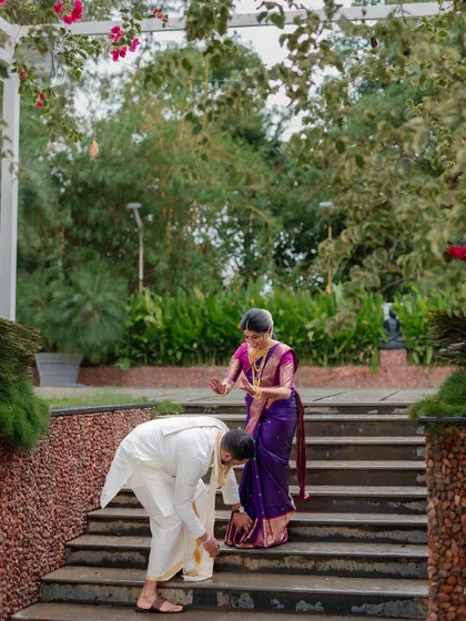 A romantic stroll in the rain. We embrace every element of the wedding day, even a little monsoon magic, to create unique and memorable couple portraits.