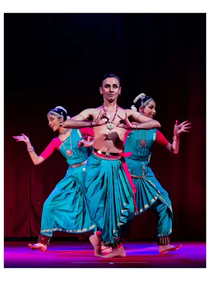 A powerful pose with two of my senior dancers. The symmetry and strength in this formation reflect the core principles of Bharatanatyam that we practice.