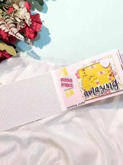 An inside page with a shaker element from the birthday mini scrapbook.