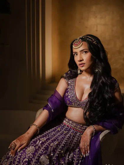 A seated portrait of Shubhangi, looking every bit the princess on her Sangeet night.
