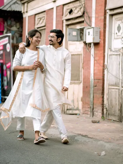 Another angle of their walk, showing their happy interaction. My goal is to make the photoshoot feel like a fun day out.