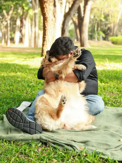 A big, warm hug for the best dog ever. These are the wholesome, loving moments I strive to capture, showing the incredible bond between a dog dad and his furry best friend.