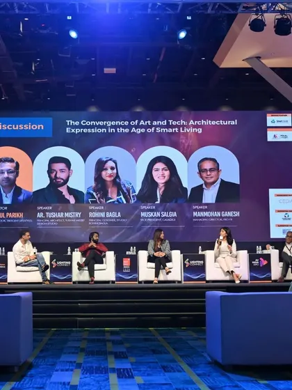 A wide shot of the panel discussion on "Designing Smart Homes" at the Smart Home Summit, featuring our Managing Director, Manmohan Ganesh.