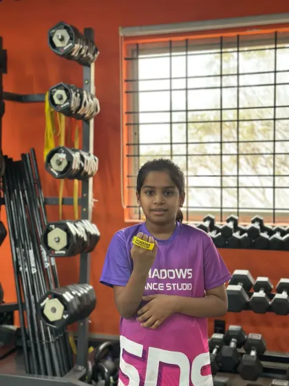 Ananya with her well-earned yellow band. Her top performance in the intermediate level test was truly impressive.
