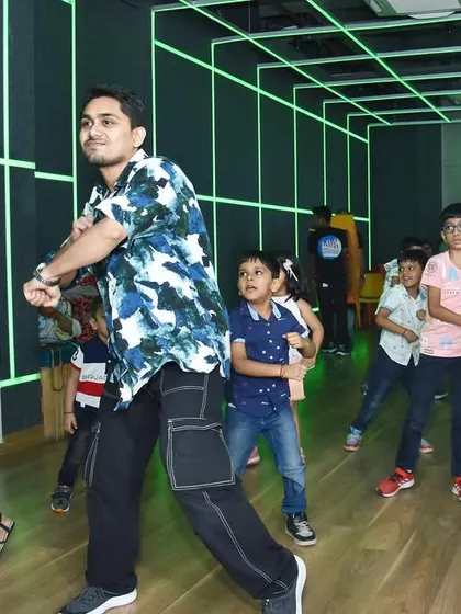 Moments from a high-energy dance party and workshop for kids. These events are full of fun, learning basic choreography, and enjoying dance in a group.