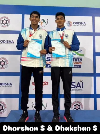 The twin power of Dharshan S & Dhakshan S on the podium.