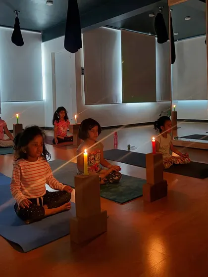 A moment of calm and focus during our Trataka or candle gazing meditation. This ancient practice helps children improve concentration, calm their minds, and even get better sleep.