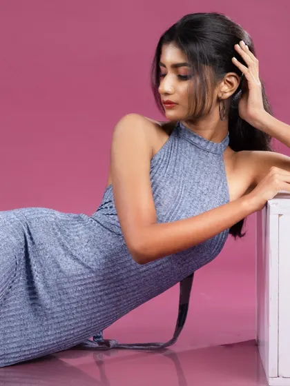 A different angle of a pose, showing the model's profile.