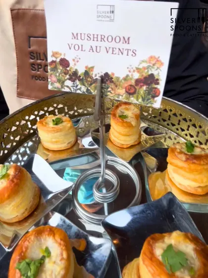Our Mushroom Vol Au Vents are a classic French appetizer. These flaky puff pastries are filled with a creamy mushroom mixture and served on an elegant tiered platter.