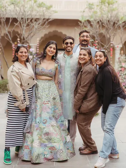 A happy moment with the couple and my team at their Parisian Market Mehendi. It's always a joy to see a unique concept come to life so beautifully.