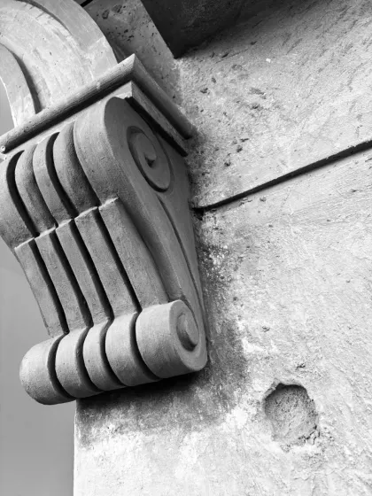 Details matter. This close-up shot shows the intricate carving of a French-style moulding on a column. These small quirks and crafted elements have a big impact on the overall feel and sophistication of a space.