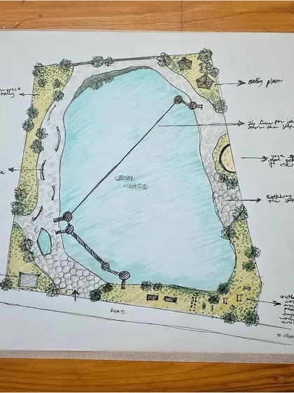 A refined master plan sketch for the lakefront development. This drawing consolidates the various elements into a complete vision, showing the relationship between the water body, landscaping, recreational facilities, and access roads.