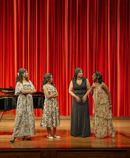 A duplicate of 25, showing the full group on stage. Ensemble singing requires a special kind of connection and listening.