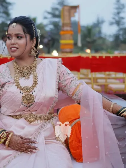 Our bride Purvi having her main character moment in a blush pink bespoke blouse.