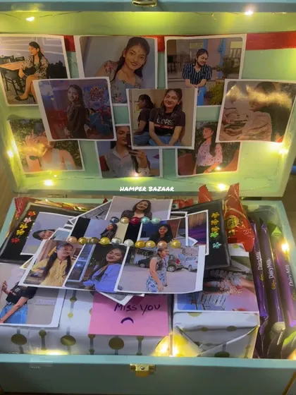 A trunk full of memories for a best friend! This trunk was fully customized with photos and filled with her favorite things. We can create similar personalized trunks for any occasion.