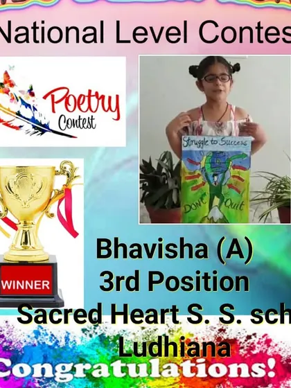 The third-position winner in our poetry contest, seen here with her creative artwork that accompanied her performance.