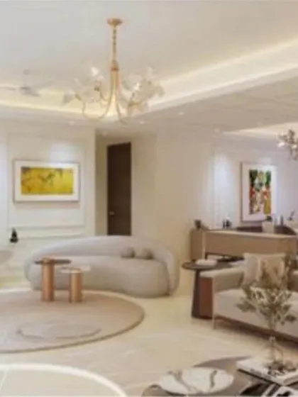 Another perspective of the Platinum Tower living area, showcasing the curved sofa and circular rug that define a distinct seating zone.