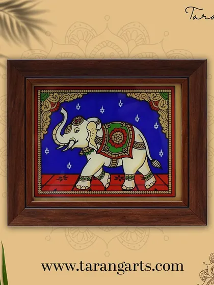 An elegant glass painting of a white elephant, a symbol of royalty and good fortune. The intricate details of its adornments and the rich blue background create a truly regal piece of art.