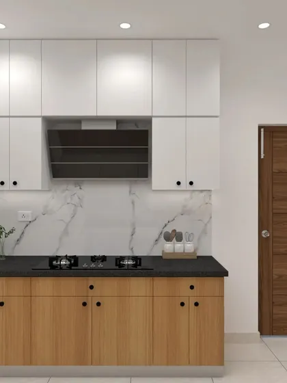 A straight-line kitchen layout perfect for smaller spaces. The wood and white cabinet combination is paired with a marble-finish backsplash and a black chimney for a contemporary look.