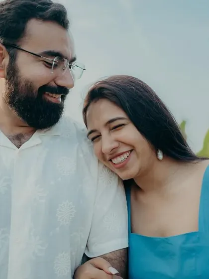 A sweet, candid moment of her resting her head on his shoulder. These simple gestures of affection are what make a couple shoot feel so personal and real.