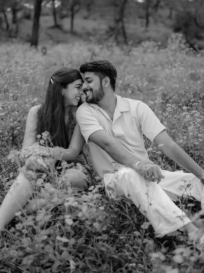 The same moment captured in timeless black and white. This edit brings a different emotion, focusing purely on their connection.