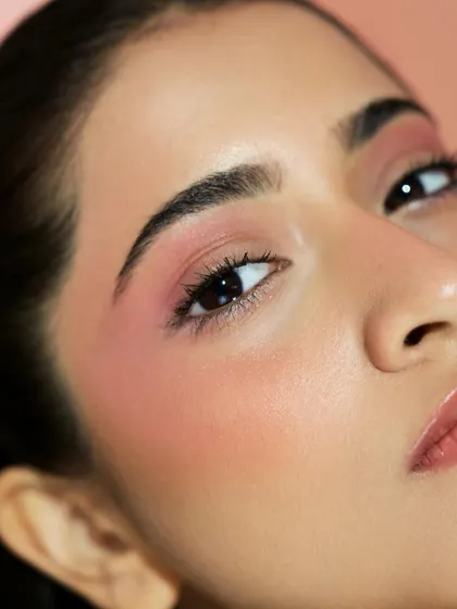 The light catches the subtle highlighter on the cheekbone, demonstrating the "lit from within" glow that we strive for at the academy.