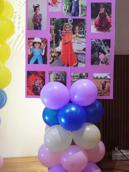 A photo collage board on a balloon stand, a great way to display memories at a party.