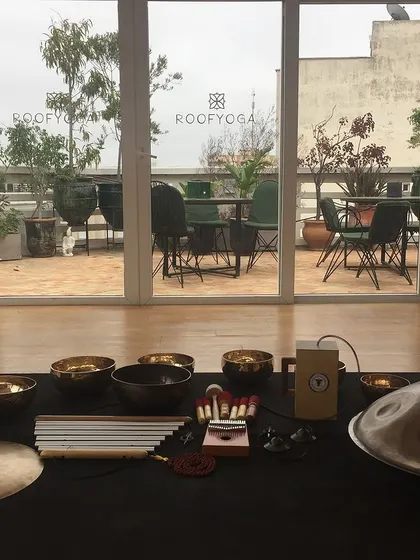 The view from my sound healing teacher training course at Roof Yoga in Casablanca. The instruments are laid out, ready to create healing vibrations with a beautiful city view as the backdrop.