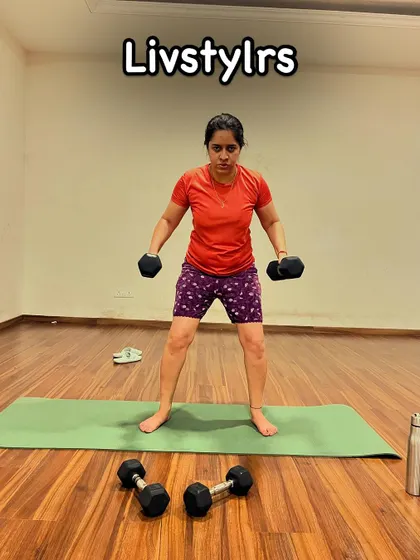 A duplicate of image 212, showing a client's strong and stable squat form.