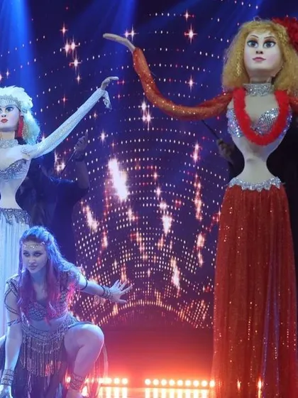 The belly dancer puppets in full glory, with their intricate costumes and expressive forms, lighting up the stage.