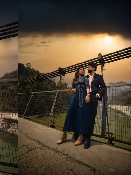 Another perspective from their dramatic Rishikesh pre-wedding shoot. The composition emphasizes the vast landscape, making their embrace feel even more significant.