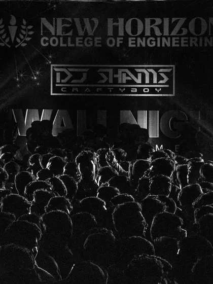 A black and white shot of the New Horizon College crowd. Even without color, the energy and scale of the event are undeniable.
