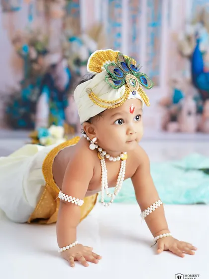 Little Krishna vibes and endless cuteness. This crawling pose captures the playful and divine spirit of a Janmashtami-themed baby shoot.