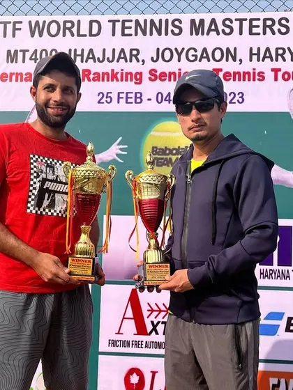 Posing with our trophies after a successful doubles win at the ITF World Tennis Masters Tour MT400 in Jhajjar. Teamwork makes the dream work.