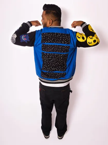 Showing off the back of the custom jacket. The details matter, both in my music and my style.