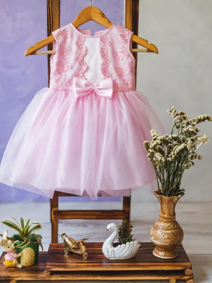 A beautiful pink tulle and lace dress, showing that every dress I create is a canvas for creativity.