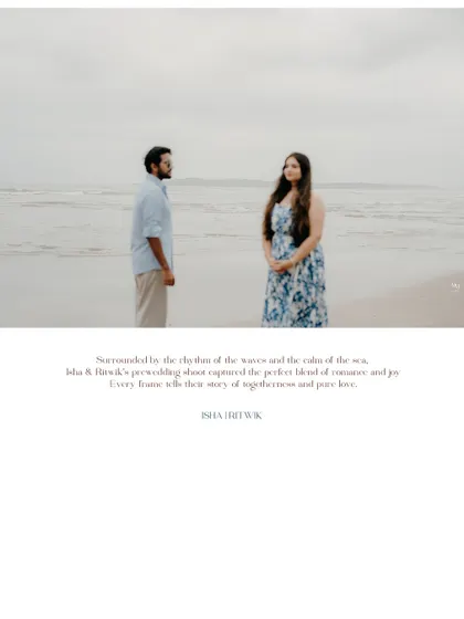 A beautifully framed shot of the couple standing by the sea, capturing the perfect blend of romance and joy in a single, serene frame.