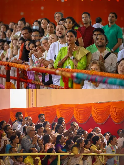 Devotees watch with rapt attention and hands in prayer during a homa. The collective focus and devotion during these events create an atmosphere of profound sanctity.
